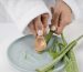 close-up-hands-taking-aloe-vera-gel